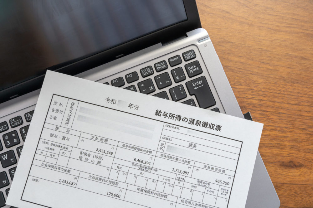 Q.日本親会社が海外出向者に給与を支払う場合の源泉徴収制度について教えてください。